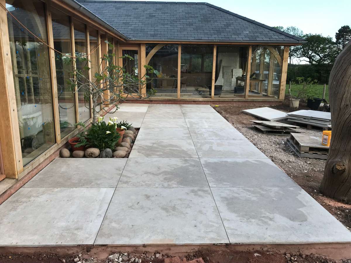Limestone slabs around oak framed building, Woodbury